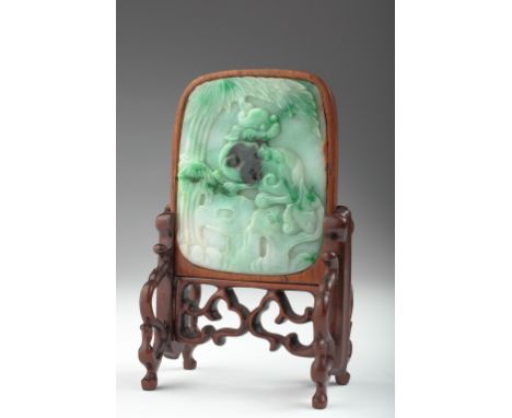 Age: late 19th/early 20th century. (Possibly from Qing Period)  Description: A natural jadeite table screen depicting a mythi