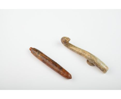 Age: Probably Song Dynasty  Description: An archaic period Chinese stone pendulum form pendant of russet and blackish brown c