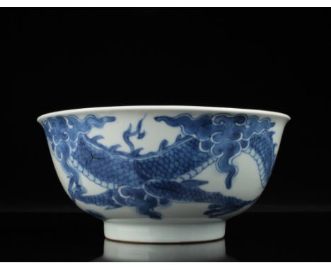 Age: Probably 19th Century.   Description: A Chinese blue and white "Dragon and Pearl" bowl, painted apocryphal Yongzheng mar