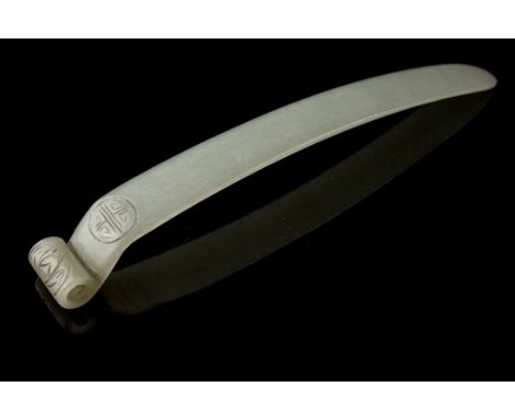 Age: Qing Dynasty - 18th / 19th century  Description: A fine white jade "page-turner" or "hairpin" carved from an even pale c