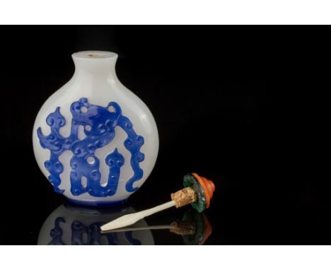 Age: Qing dynasty   Description: Beautifully carved Chinese overlay Bejing / Peking glass moon-shaped snuff bottle. An archai