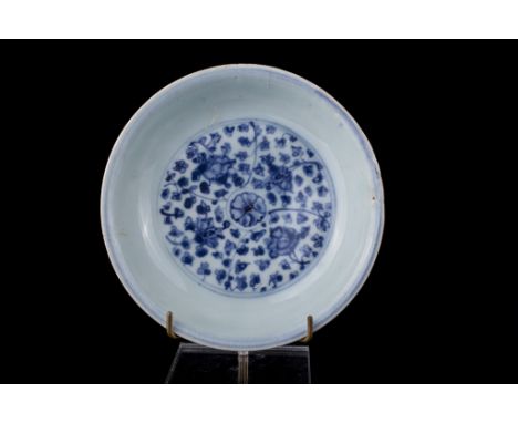Age: Ming dynasty, probably Hongzhi period  Description: An underglaze blue bowl decorated with a roundel of scrolling floral