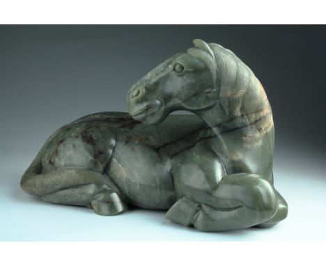 Date: 20th century or earlier.  Description: A magnificent and exceptionally large Chinese nephrite jade horse. Masterfully c