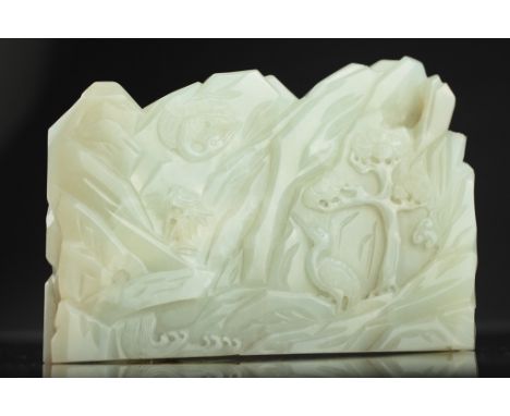 Age: 18th century  Description: A finely carved celadon jade table screen. The celadon jade table screen carved with a landsc