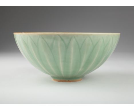 Age: Southern Song or later, 12th century or after  Description: A Chinese Longquan porcelain celadon bowl, finely carved and