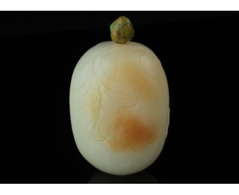 Age: Qing dynasty   Description: A melon-shaped Chinese white nephrite jade snuff bottle with russet blushed. Well-carved wit