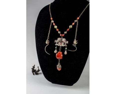 Age: Qing dynasty, 19th century   Description: A charming Chinese silver, turquoise, coral and carnelian necklace, hung with 