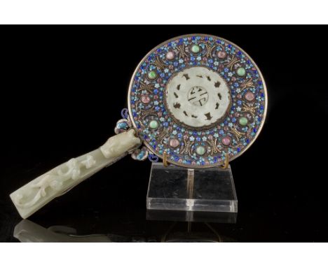 Age: Qing dynasty  Description: A Chinese gilt silver cloisonne handmirror with white jade belt hook handle and white jade me