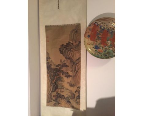 Age 20th. century    Description: A Chinese silk scroll painting painted with figures below an ancient Pine tree by a pavilio