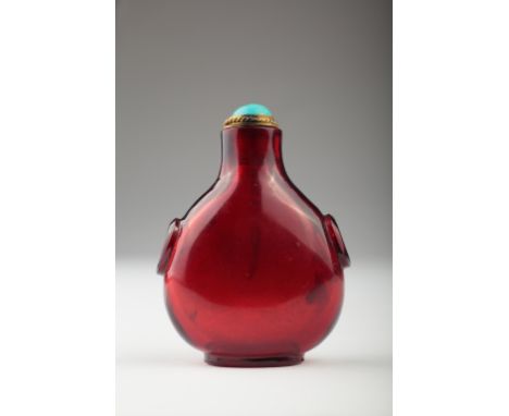 Age: Qing dynasty   Description: A Chinese ruby red Beijing / Peking glass snuff bottle, of flattened tapering ovoid form. We