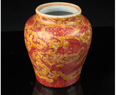 Age: probably Jiajing - Ming dynasty.  Description: A rare early jar decorated with archetypal imperial iron-red glazed five-