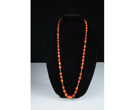 Age: 19th century   Description: An exceptional 19th century butterscotch amber bead necklace of graduated ovoid beads. The a