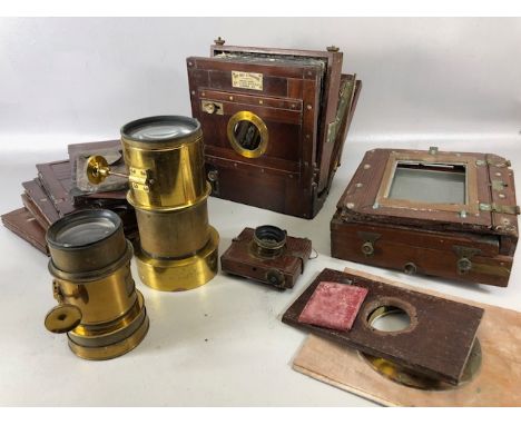 Antique Camera, mahogany and brass, plate glass camera parts including  two  lenses one marked Pioneer City sales and Exchang