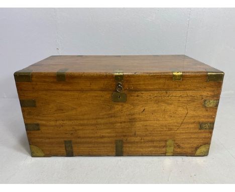 Large Campaign travelling trunk with brass bindings and corners and hinged carry handles to sides approx 106 x 56 x 51cm 
