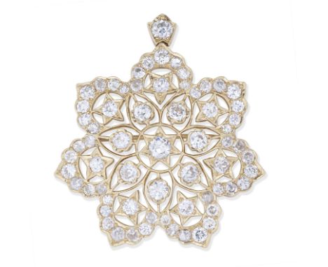 DIAMOND FLOWER BROOCH/PENDANTOf openwork design, set with old brilliant and cushion-shaped diamonds, with scalloped and star 