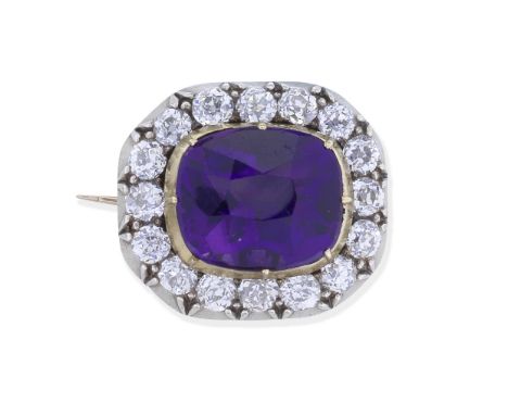 AMETHYST AND DIAMOND BROOCH, LATE 19TH CENTURYThe cushion-shaped amethyst within a cushion-shaped diamond surround, mounted i