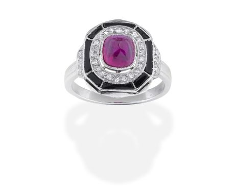 RUBY, ONYX AND DIAMOND PLAQUE RING, CIRCA 1925The sugarloaf ruby, within a single-cut diamond and onyx surround, between old 