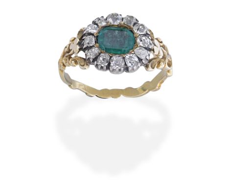 EMERALD AND DIAMOND RING, EARLY 19TH CENTURYThe step-cut emerald within a cushion-shaped diamond surround, within closed-back