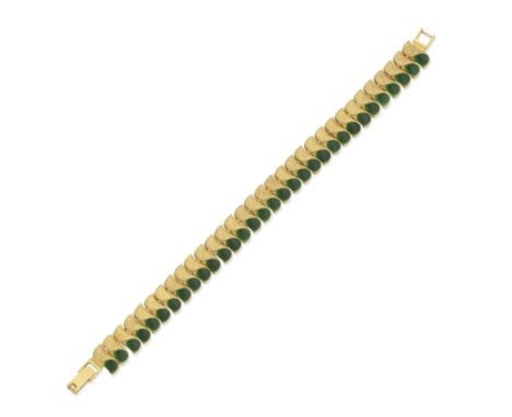ENAMEL BRACELETComposed of green enamel and textured links, length 8.2cmFor further information on this lot please visit Bonh