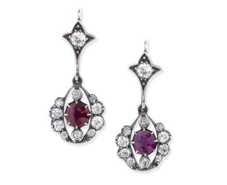 RUBY AND DIAMOND PENDENT EARRINGS, 19TH-20TH CENTURYEach cushion-shaped diamond surmount, suspending a cushion-shaped ruby wi