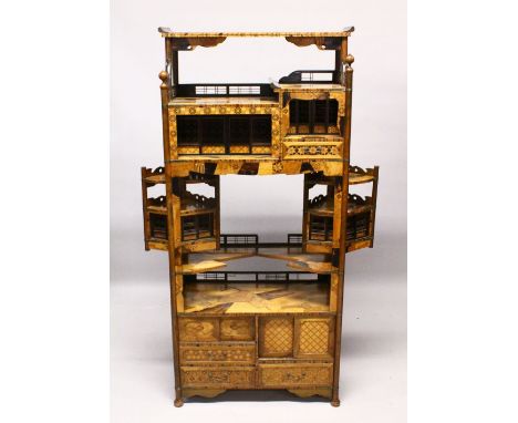 A JAPANESE MEIJI PERIOD EXOTIC WOOD INLAID OPEN SHELF CABINET, with an array of exotic inlaid timbers, with sliding openwork 