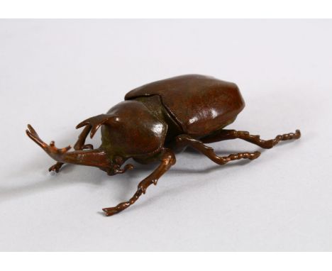 A JAPANESE BRONZE FIGURE OF A STAG BEETLE, The back opening for storage, 9cm