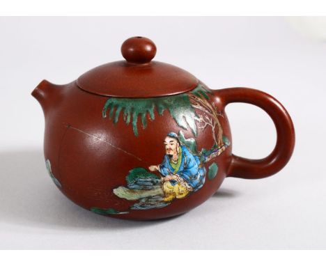 A CHINESE YIXING CLAY ENAMEL DECORATED TEA POT, decorated with a figure fishing, the base with ana impressed mark, the verso 