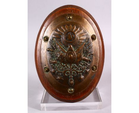 A RARE 19C OTTOMAN TURKISH BRONZE PLAQUE BEARING THE OTTOMAN COAT OF ARMS. Probably from a cannon, 19cm x 14cm high.