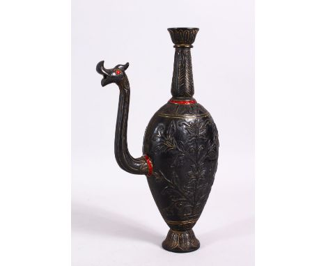 A 19TH / 20TH CENTURY CARVED JADE HUQQA BASE, carved with floral decoration, the spout carved as a beast, with inlaid wire an