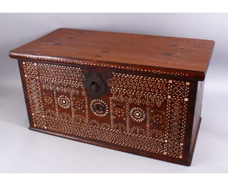 A GOOD 18TH / 19TH CENTURY GUJARAT INDIAN MOTHER OF PEARL INLAID TRUNK, 36cm high x 69cm wide.