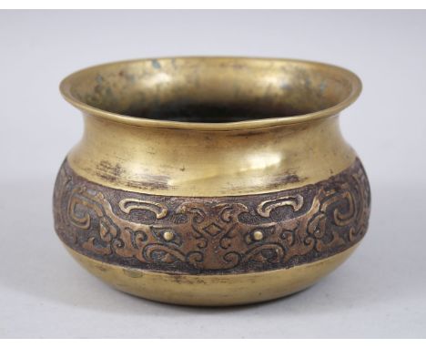 A 19TH / 20TH CENTURY CHINESE BRONZE CENSER, the body with decoration of taotie marks, 13cm diameter x 7.8cm high.`