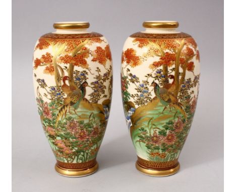 A GOOD PAIR OF JAPANESE MEIJI / TAISHO PERIOD CERAMIC VASES, each vase upon a beige ground with typical orange and gilt decor