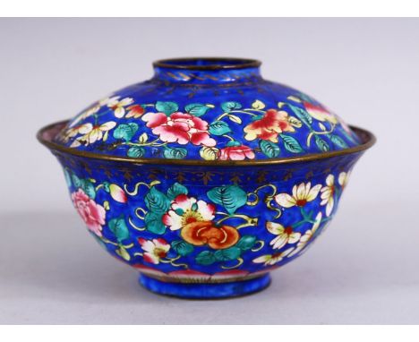 A GOOD CHINESE 18TH CENTURY CANTON ENAMEL BOWL &amp; COVER, With a blue &amp; aubergine ground, decorated with native floral 