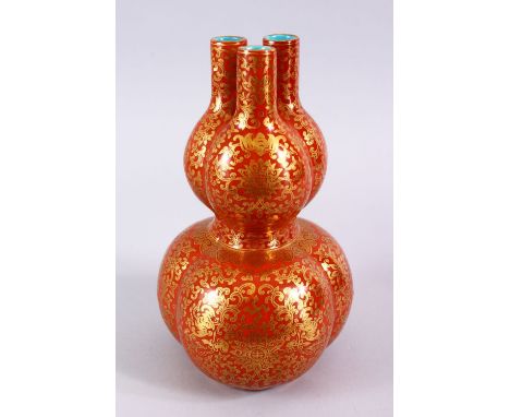 A FINE CHINESE CORAL GROUND TULIP SHAPED PORCELAIN VASE, the body of the tulip / gourd shaped vase with gilt decoration of ru
