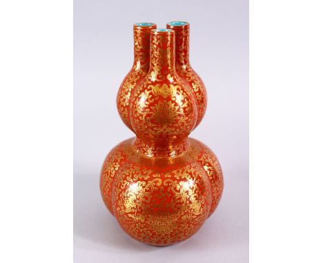 A FINE CHINESE CORAL GROUND TULIP SHAPED PORCELAIN VASE, the body of the tulip / gourd shaped vase with gilt decoration of ru