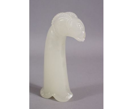 A 19TH / 20TH CENTURY CARVED WHITE / CELADON JADE MUGHAL DAGGER HANDLE - carved in the form of a ram, 14cm.
