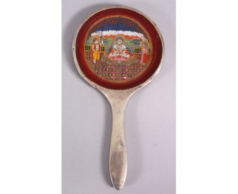 A 19TH CENTURY SILVER CASED MIRROR - PAINTED INDIAN INSERT - The mirror with no glass, replaced with a painting of a seated d