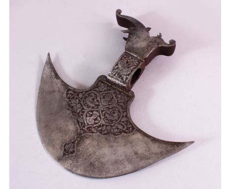 A FINE 19TH CENTURY PERSIAN QAJAR GOLD INLAID ENGRAVED STEEL AXE HEAD, with carved figures and bird decoration, 20cm x 22cm.