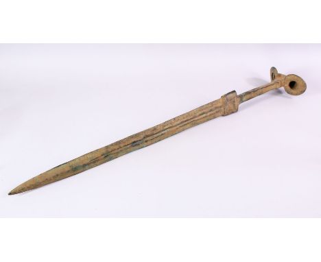 A LARGER EARLY LURISTAN BRONZE SWORD,  with a moulded top, 80cm