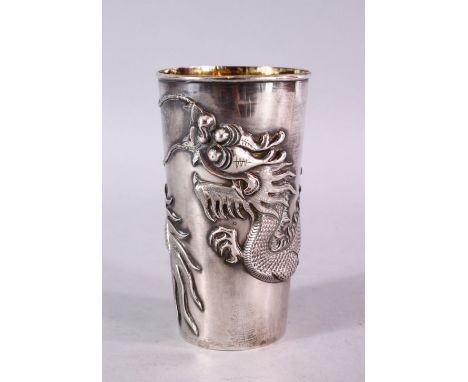 A 19TH CENTURY CHINESE SILVER DRAGON BEAKER, with on laid silver dragon decoration, the base with an impressed mark "CS" 12cm