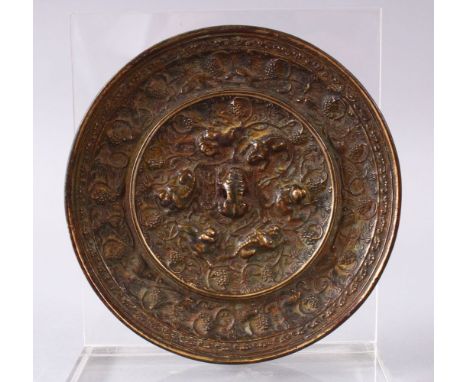 A GOOD 19TH CENTURY OR EARLIER CHINESE BRONZE TANG STYLE MIRROR, with vine decoration and moulded beasts, 13cm.