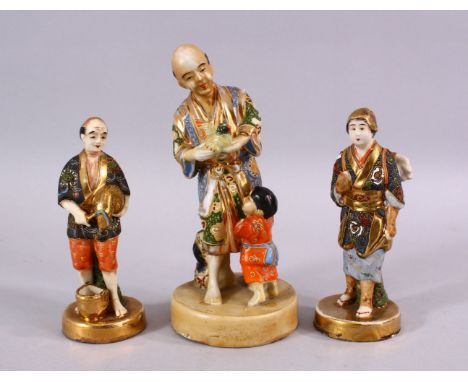THREE JAPANESE SATSUMA CERAMIC FIGURES, depicting a man and boy with catch, underside signed, 18cm high, a female traveller, 