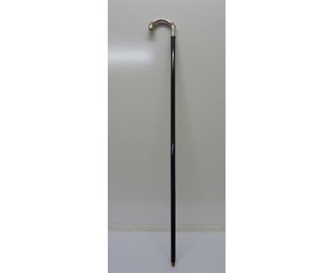 A walking stick with plated handle