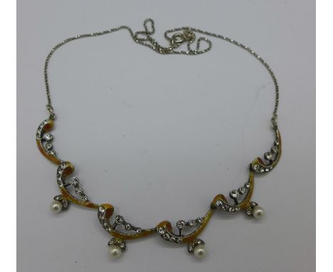 A silver, enamel and paste necklace, boxed