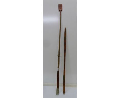 A riding crop and a bamboo swagger stick with silver embellishments