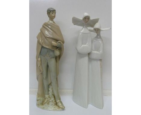 A Lladro figure of two nuns and a Nao figure of a young man