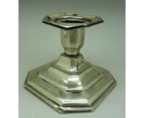 A silver dwarf candlestick marked .830, height 6.5cm