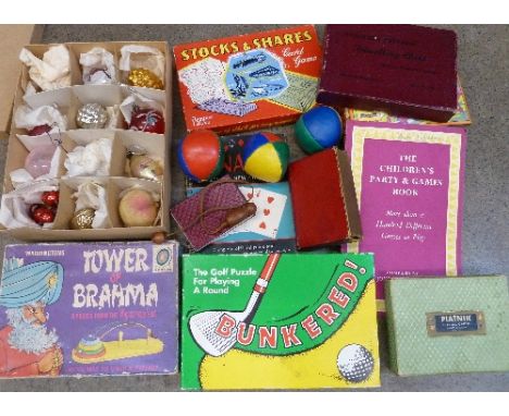 A collection of vintage games and Christmas decorations