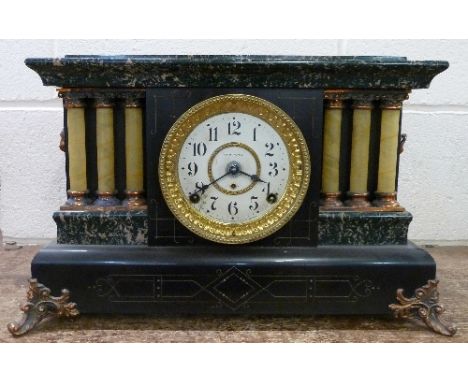 A lacquered cased mantel clock by Seth Thomas