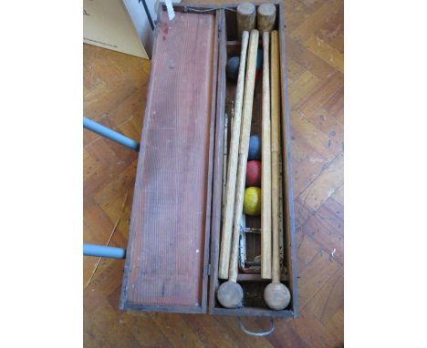 Box of Vintage Croquet Items to include Hoops, Mallets and Balls,. See photos.